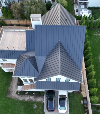 Metal Roof roofing and siding project completed by JM Roofing & Siding